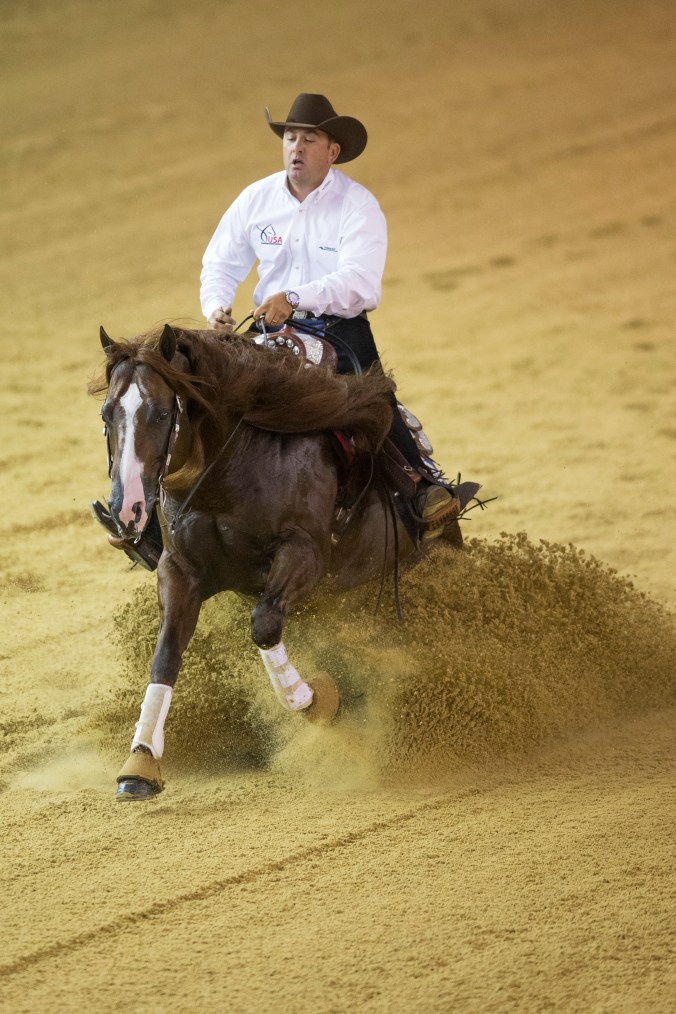 Andrea Fappani and Custom Cash Advance set the tone early for USA reining with a great Team run.Photo courtesy Dirk Caremans/FEI